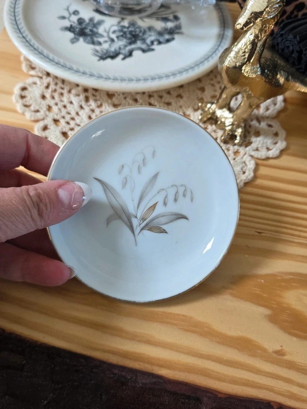 Elegant White Porcelain Butterpat with Gold Floral Accent